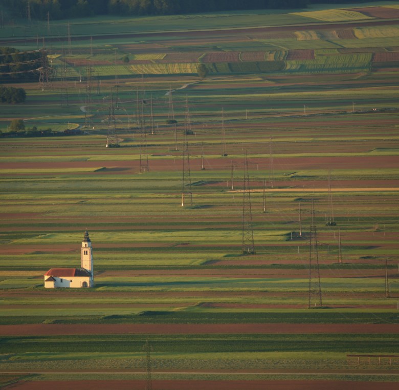 Power lines running through countryside