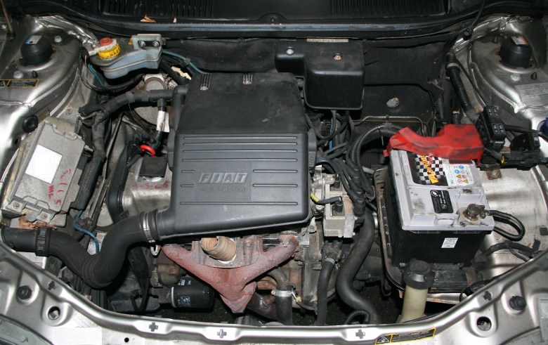 Inside the engine compartment on an old car